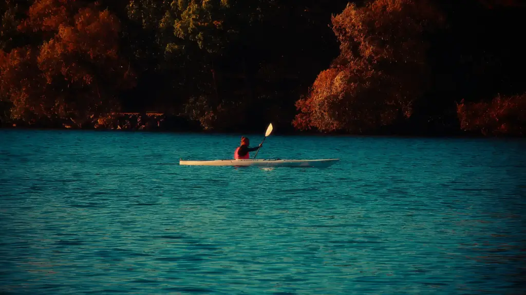 Kayaker paddling on Lake Karapiro