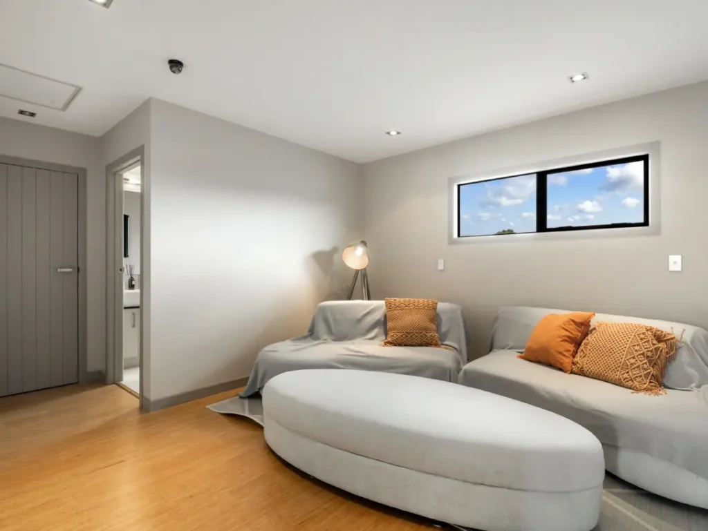 Comfortable guest lounge inside Karapiro Villas Resort